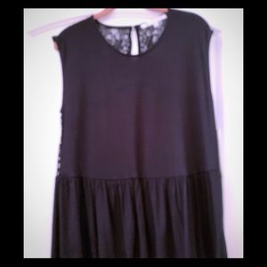 Daisy Fuentes cute black top,lace back